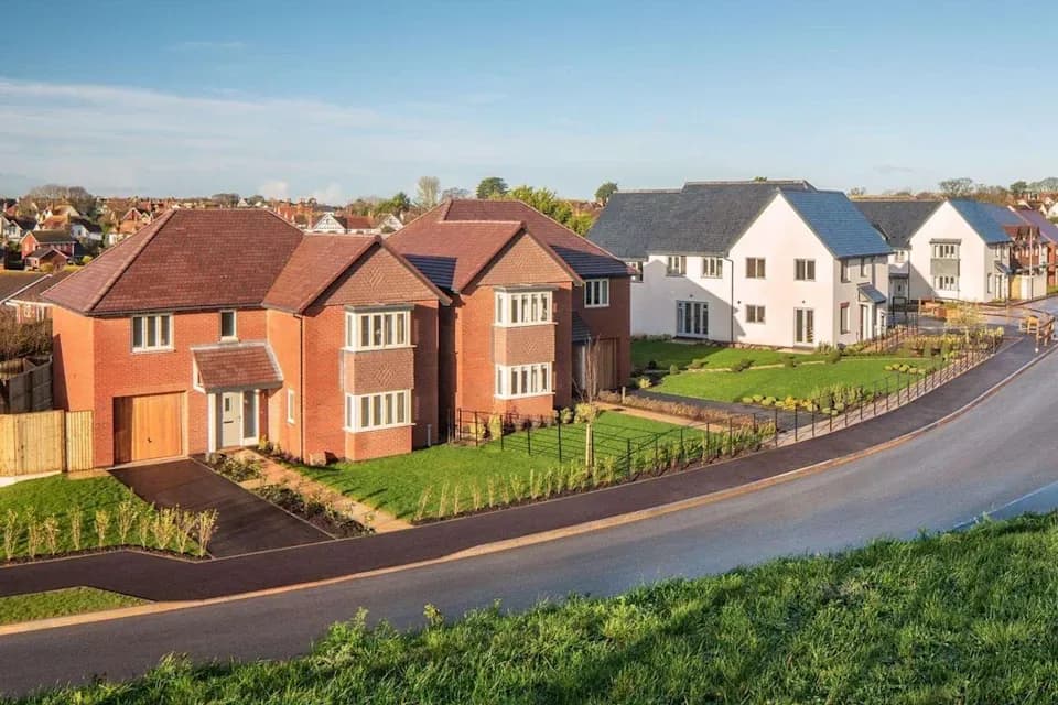 New homes by Taylor Wimpey, seen from the road
